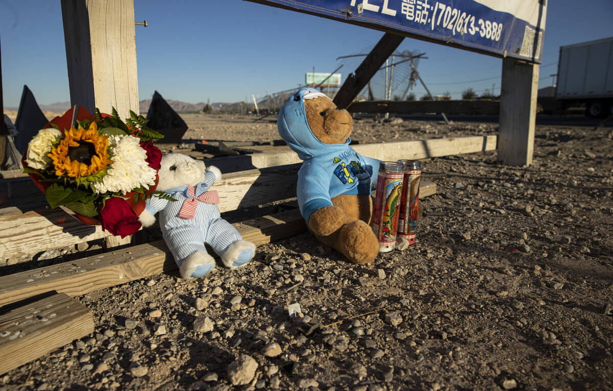Items left in memory of the victims are seen at "a mass casualty traffic collision" t ...