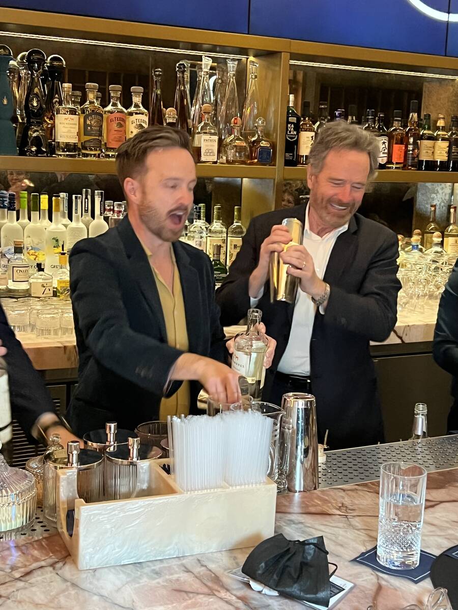 "Breaking Bad" co-stars Aaron Paul and Bryan Cranston mix drinks with their Dos Hombres mezcal ...