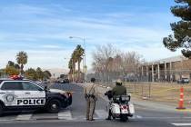 Las Vegas police cordon off a shooting scene immediately adjacent to Chapparal High School on M ...