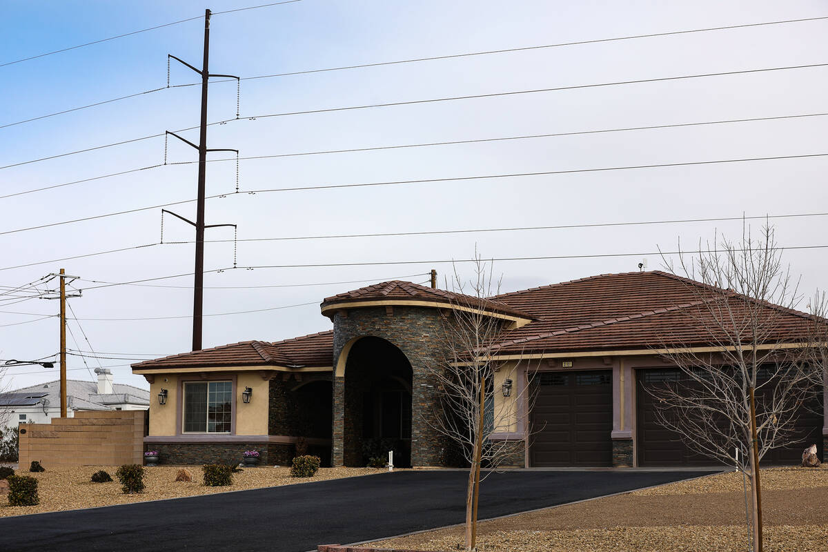 Power lines are seen near the home that was purchased by former Valley Electric Authority CEO A ...