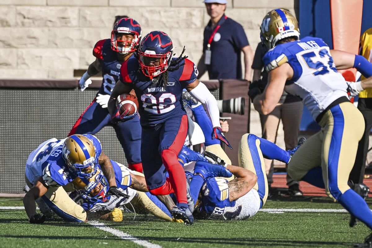 MONTREAL, QC - SEPTEMBER 21: Montreal Alouettes Running back Shaquille Murray-Lawrence (22) esc ...