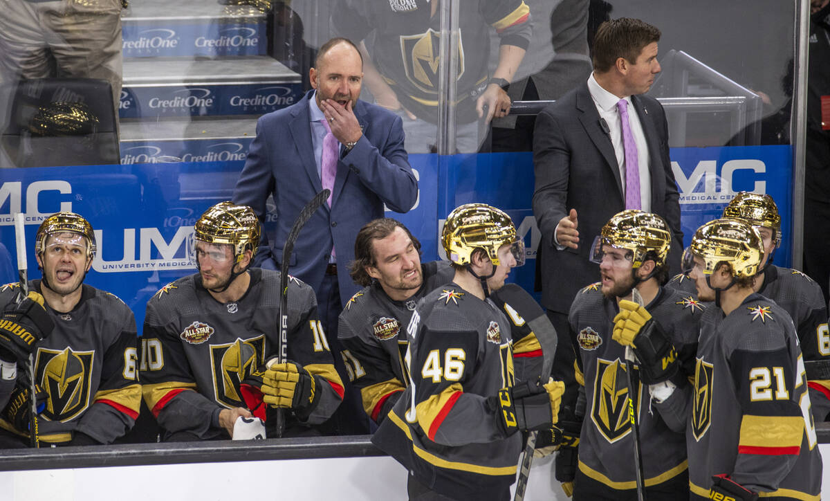 Golden Knights head coach Peter DeBoer waits to see if their third goal is counted versus the C ...