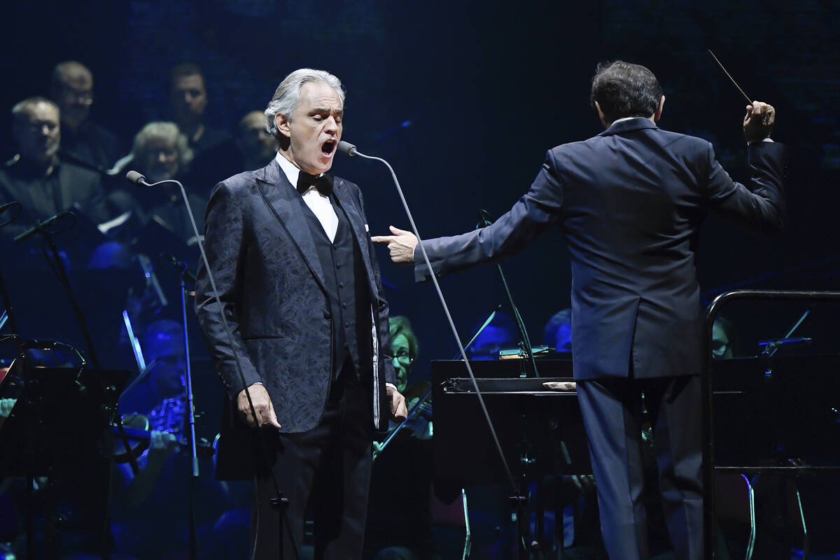Italian opera singer Andrea Bocelli performs with a choir and a symphonic orchestra lead by Ita ...