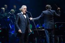 Italian opera singer Andrea Bocelli performs with a choir and a symphonic orchestra lead by Ita ...