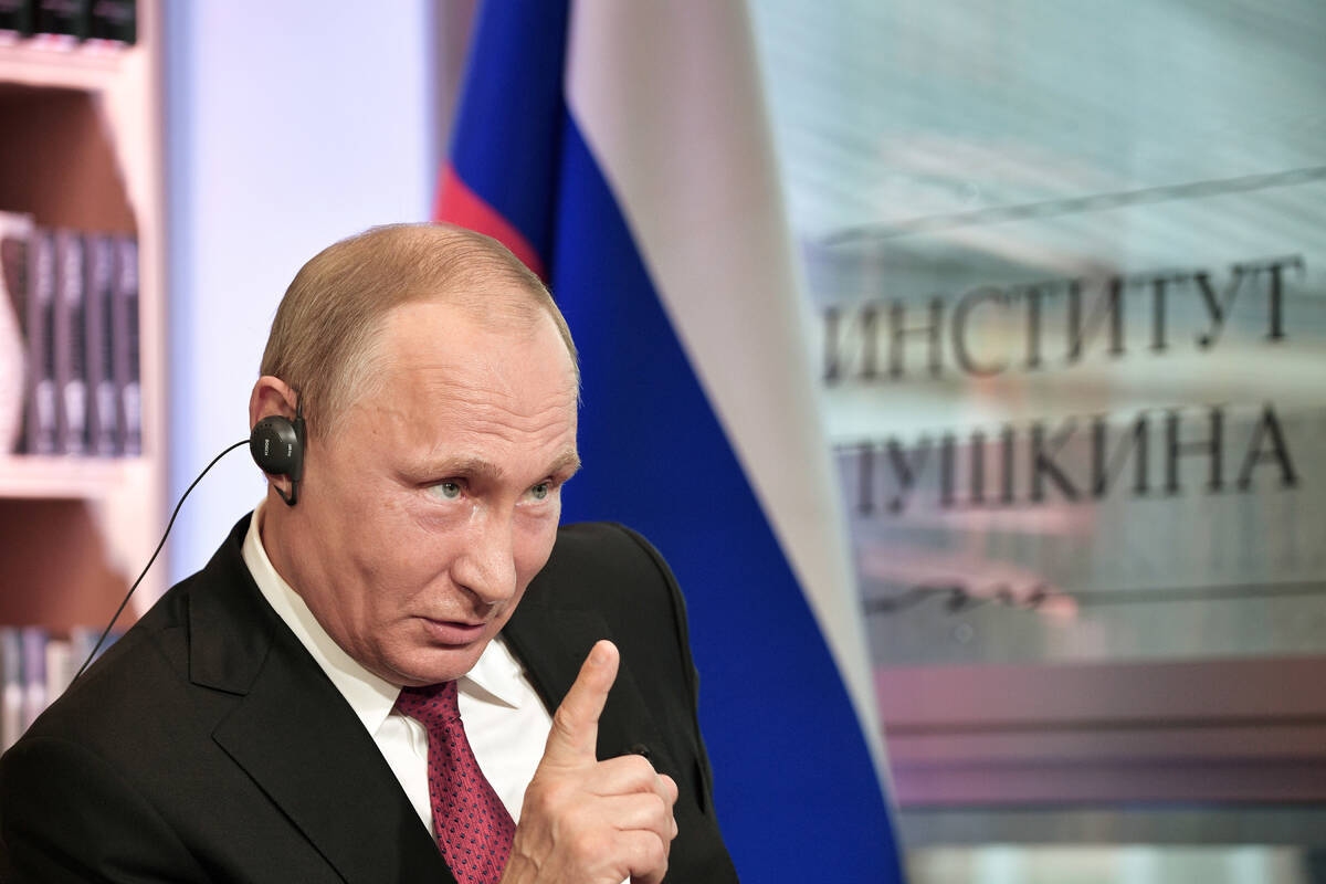 Russian President Vladimir Putin speaks during an interview in Paris. (Alexei Nikolsky/Sputnik, ...