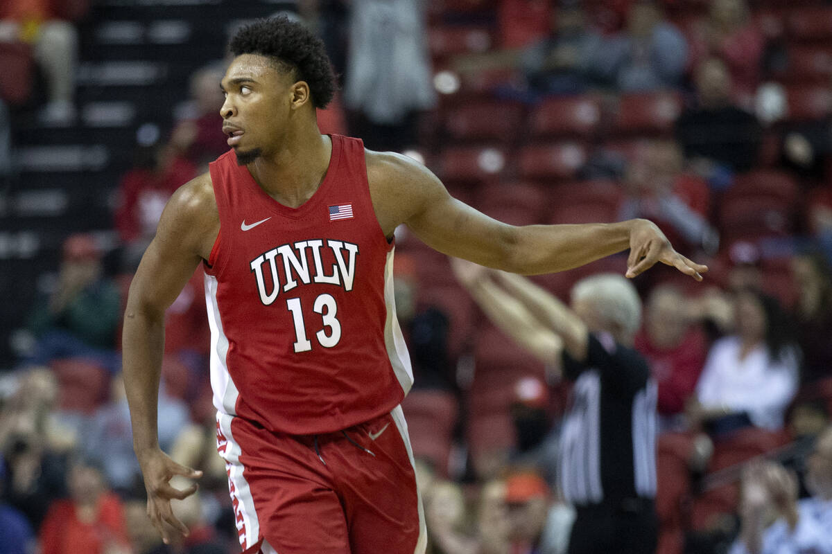 UNLV Rebels guard Bryce Hamilton (13) celebrates after shooting a three-pointer during the firs ...