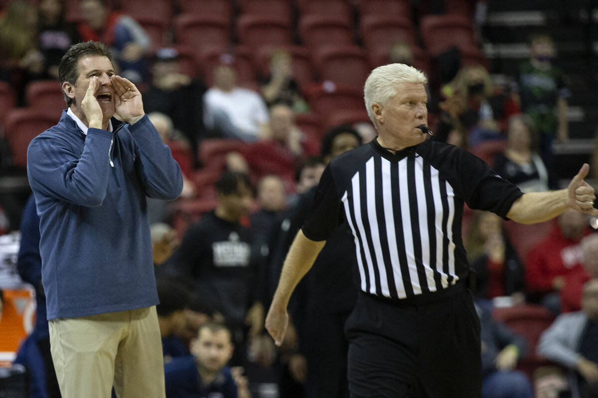 Nevada Wolf Pack head coach Steve Alford shouts from the sidelines during the second half of an ...