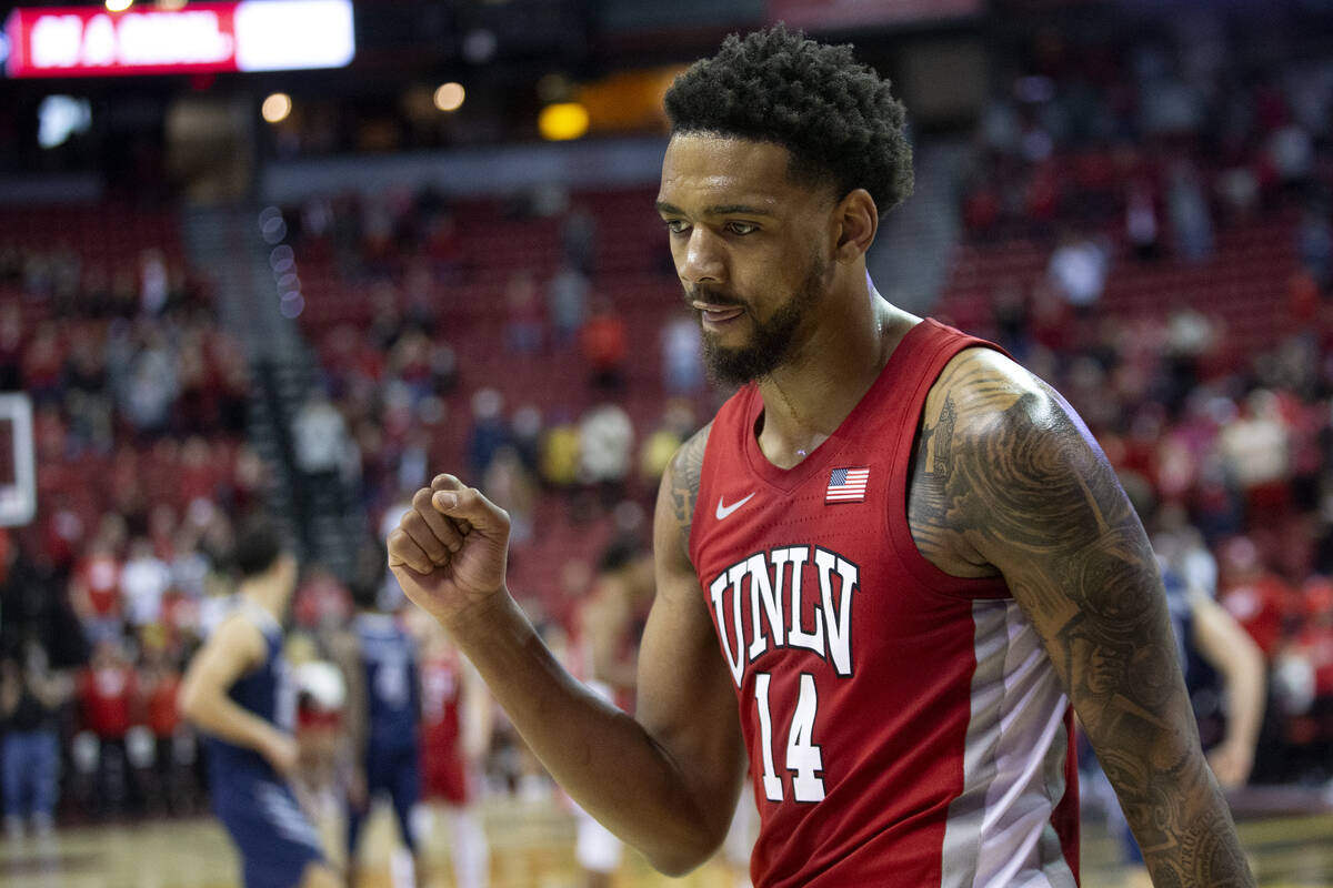 UNLV Rebels forward Royce Hamm Jr. (14) celebrates after winning an NCAA college basketball gam ...