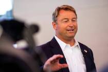 Former U.S. Sen. Dean Heller talks with members of the news media about his gubernatorial campa ...