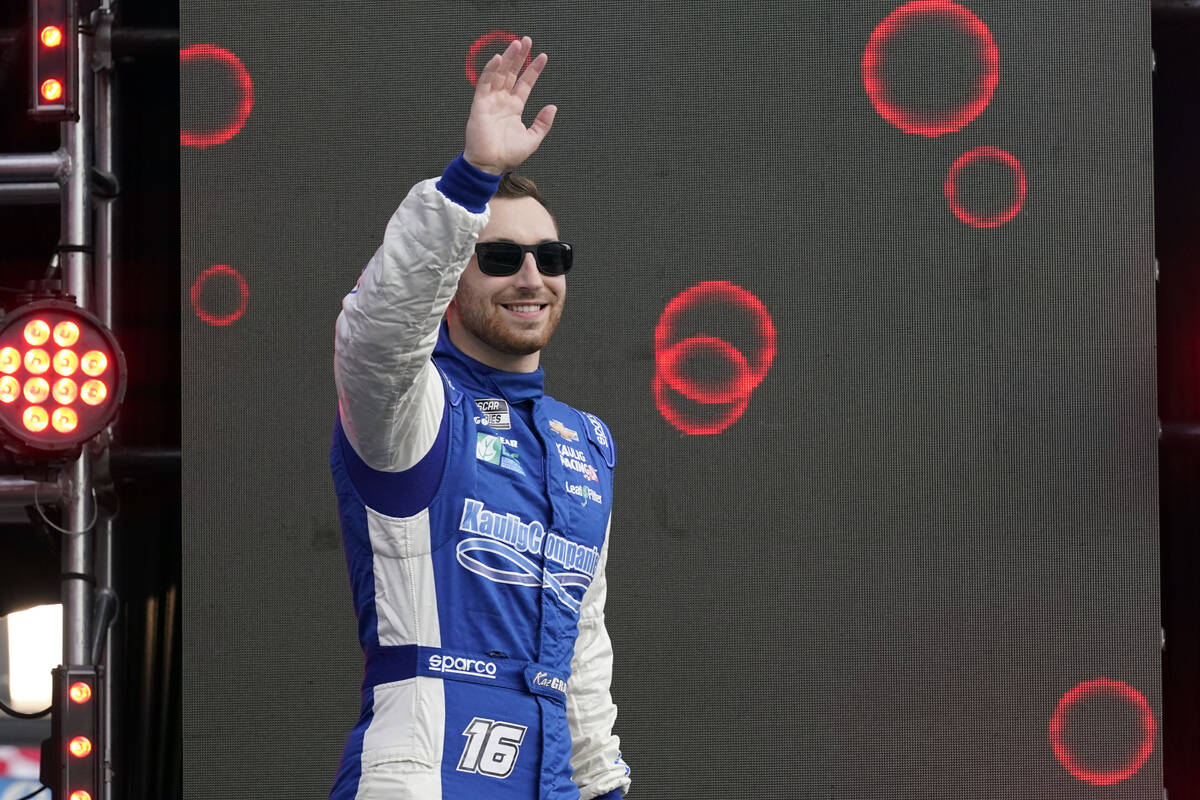 Kaz Grala waves to fans during driver introductions before the NASCAR Cup Series auto race at D ...