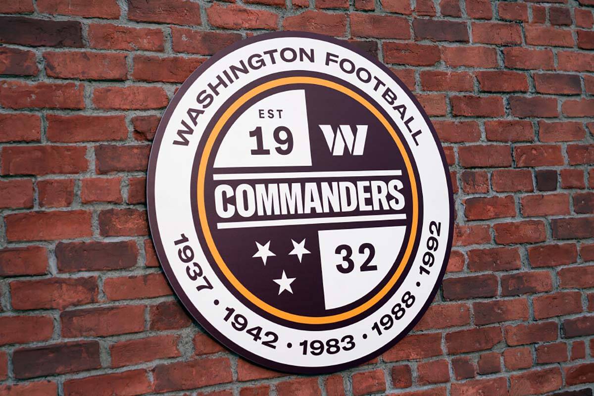 A Washington Commanders sign is shown as they unveil their NFL football team's new identity, We ...