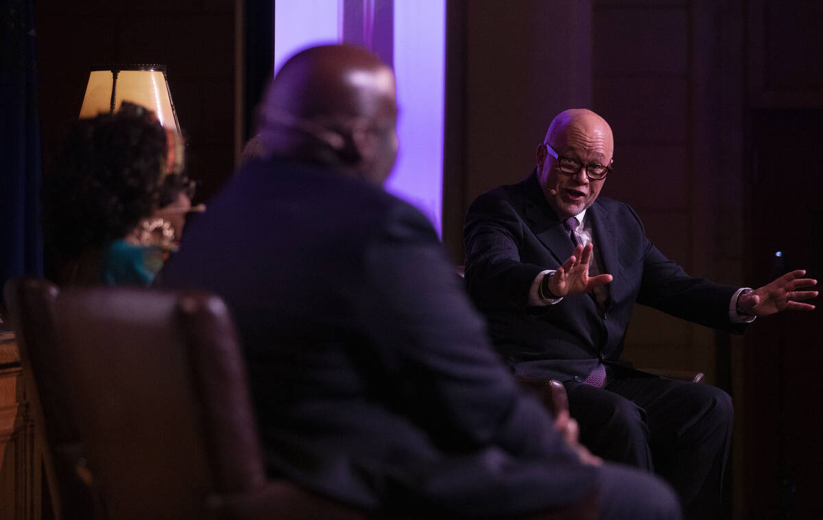 District Judge Tim Williams, right, speaks during a Black History Month panel discussion titled ...