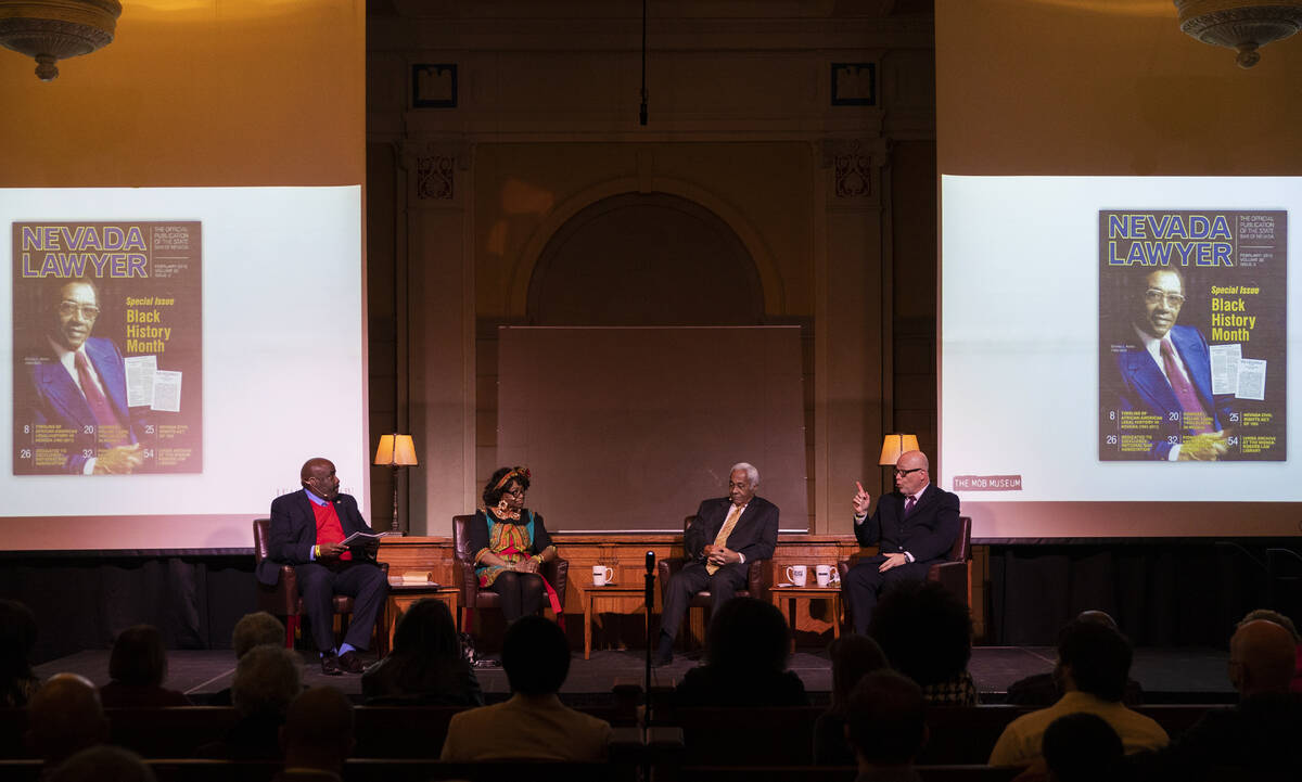 Bryan Scott, left, Judge Johnnie Rawlinson, retired Justice Michael Douglas and District Judge ...