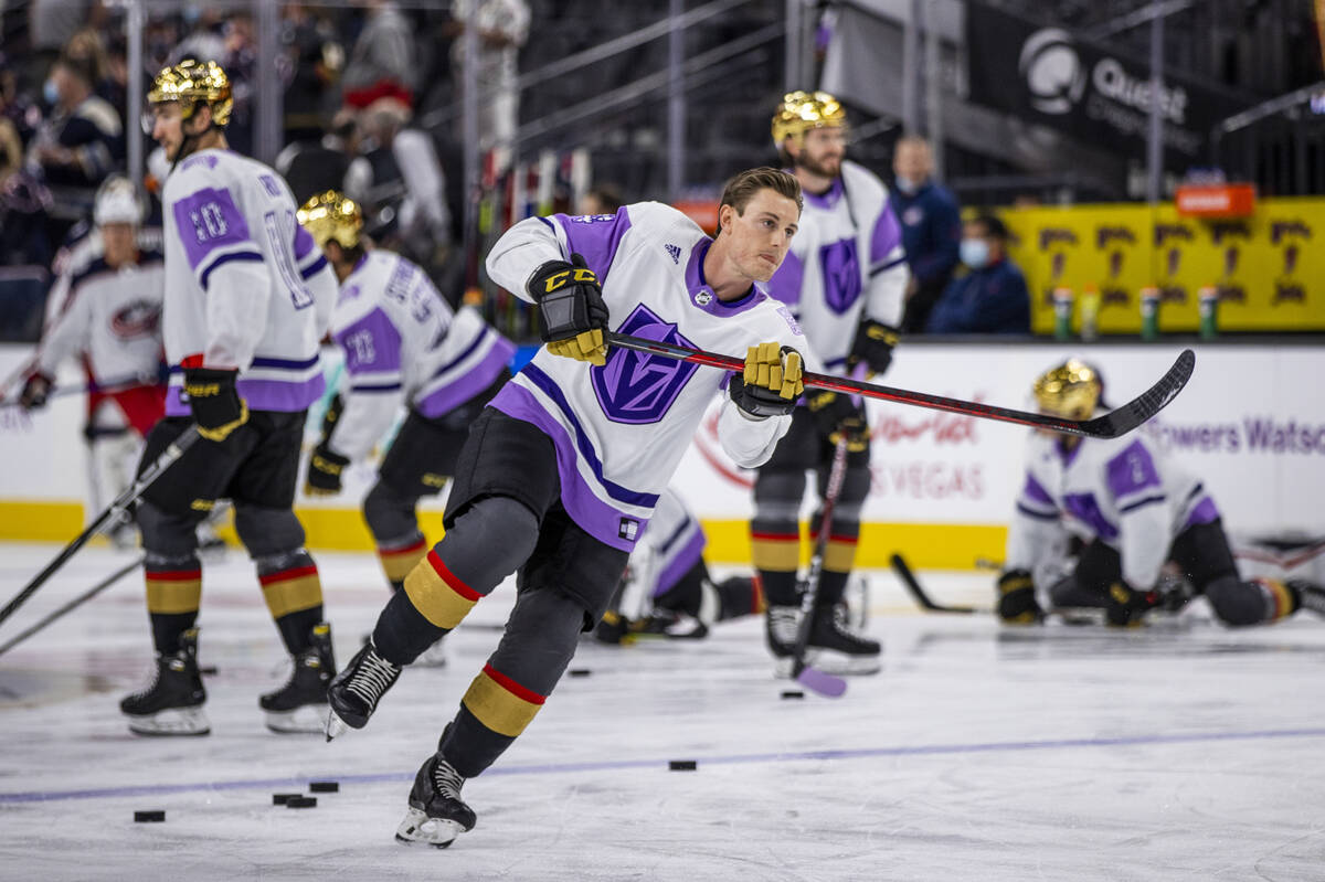 Golden Knights center Ben Jones (4) warms up before the first period of an NHL game at T-Mobile ...