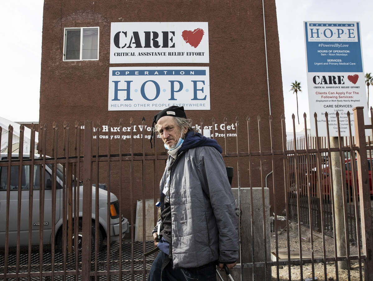 A client walks past the CARE Complex on Monday, Feb. 1, 2022, in Las Vegas. The facility is afr ...