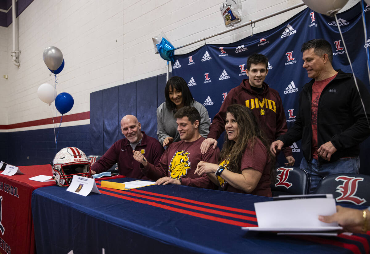 Liberty’s Brody Clark celebrates with family after signing a letter of intent to play fo ...