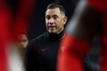 UNLV Rebels head coach Marcus Arroyo walks off the field after losing to Utah State at the end ...