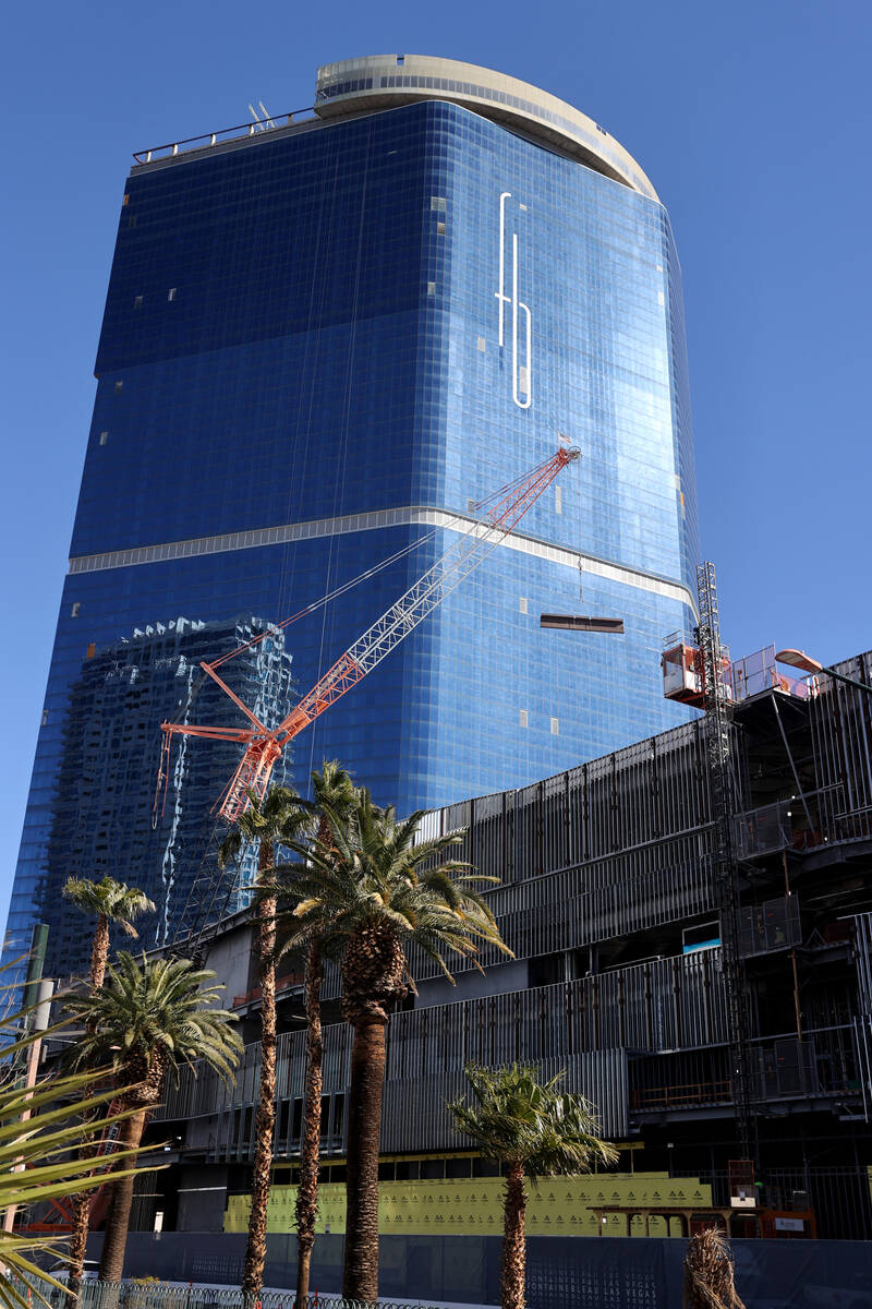 A crane works at the under construction Fontainebleau Las Vegas on the north Strip Friday, Feb. ...