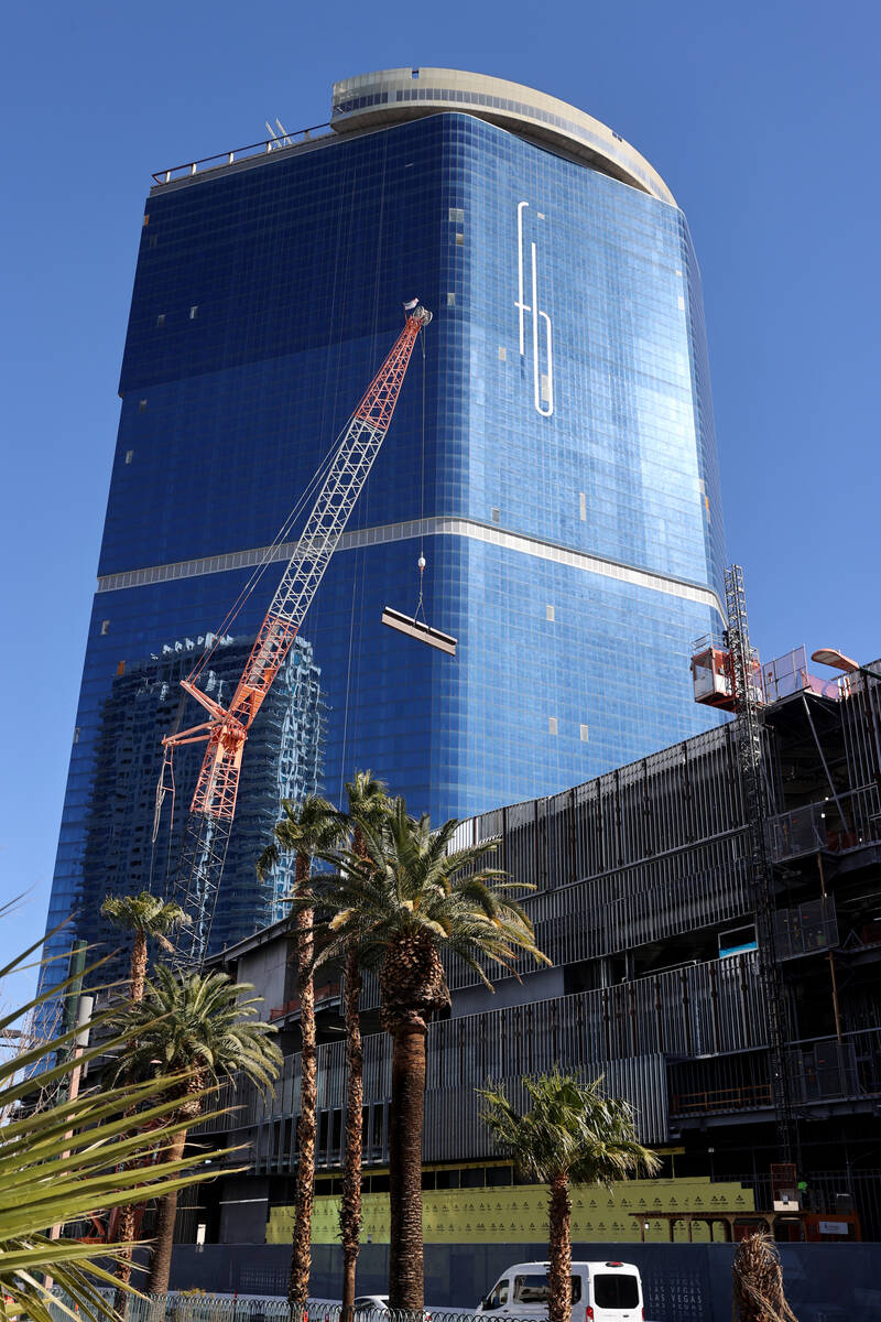 A crane works at the under construction Fontainebleau Las Vegas on the north Strip Friday, Feb. ...