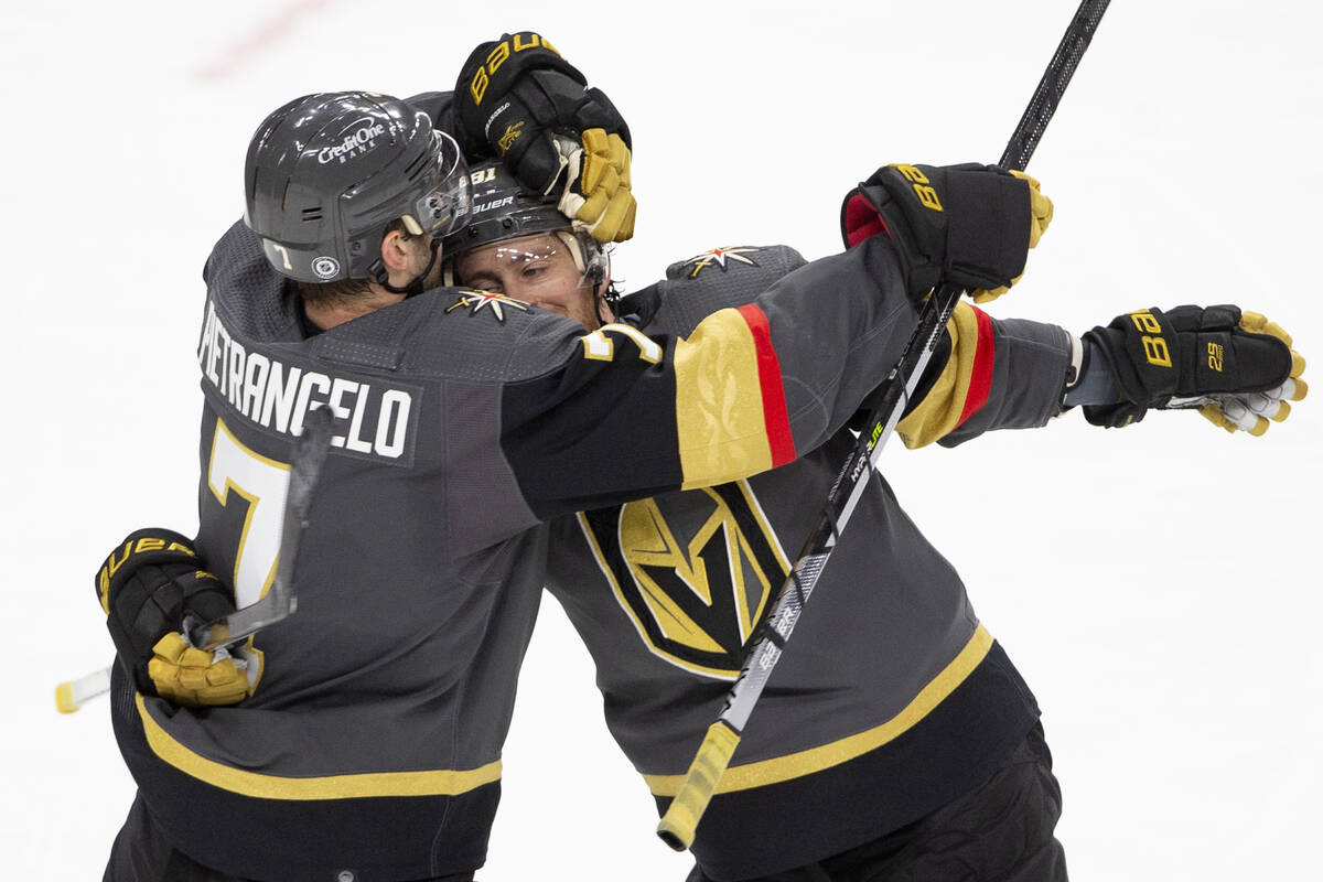 Golden Knights defenseman Alex Pietrangelo (7) and Golden Knights center Jonathan Marchessault ...