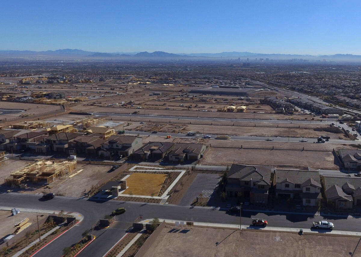 A new housing development, left, existing houses and the strip as seen from Far Hills Avenue on ...