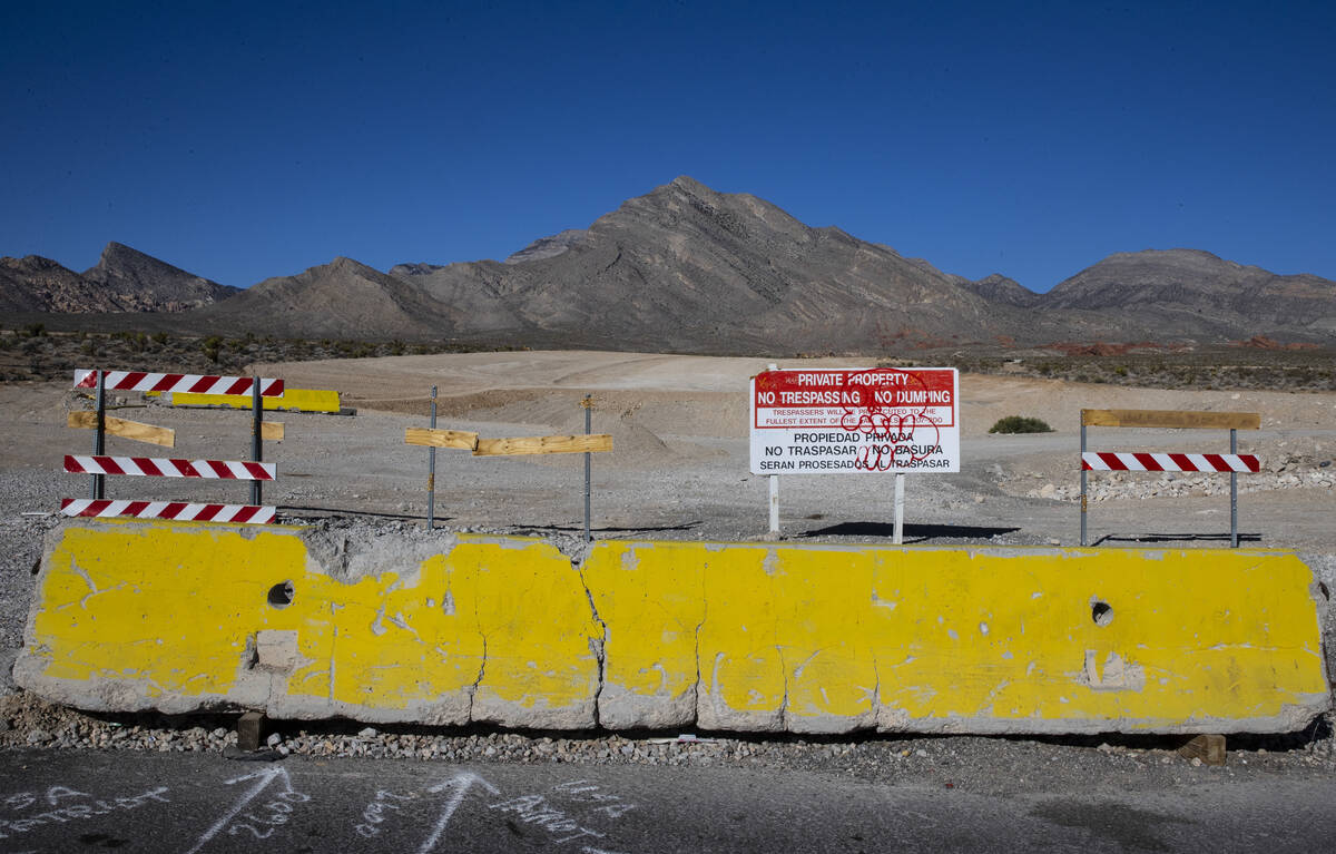 Barricades are placed at the corner of Far Hills Avenue and Sky Vista Drive where the land has ...