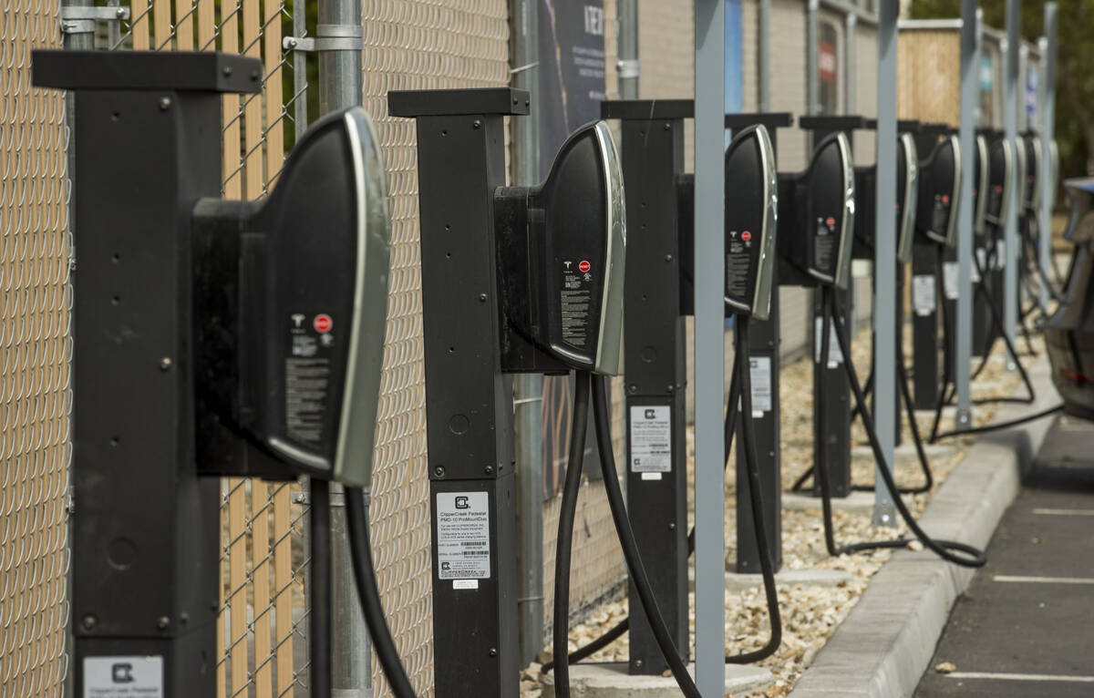 Destination chargers line the rear of the Tesla Supercharger station near The Linq and High Rol ...