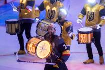 Golden Knights defenseman Alex Pietrangelo (7) participates with the Drumbots LED Drummers&#xa0 ...