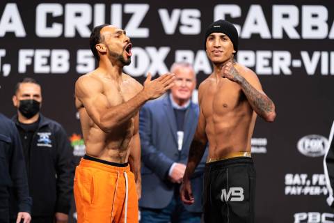 Keith Thurman, left, and Mario Barrios pose during Friday's weigh-in at Michelob Ultra Arena. P ...