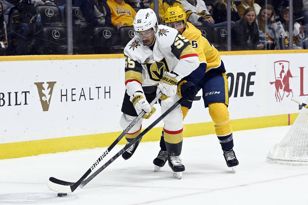 Vegas Golden Knights right wing Keegan Kolesar (55) moves the puck in front of Nashville Predat ...