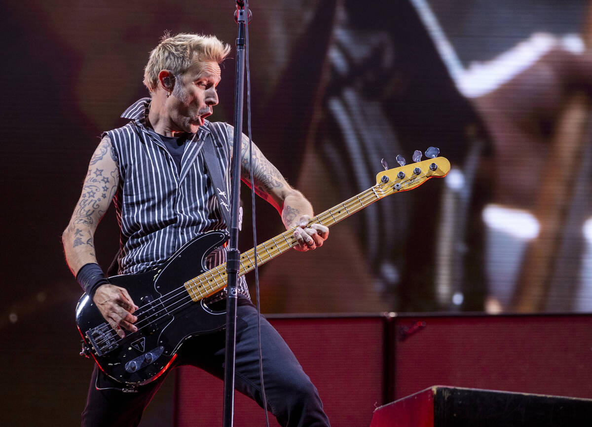 Green Day bass guitarist Mike Dirnt performs on the Downtown Stage during day two of Life is Be ...