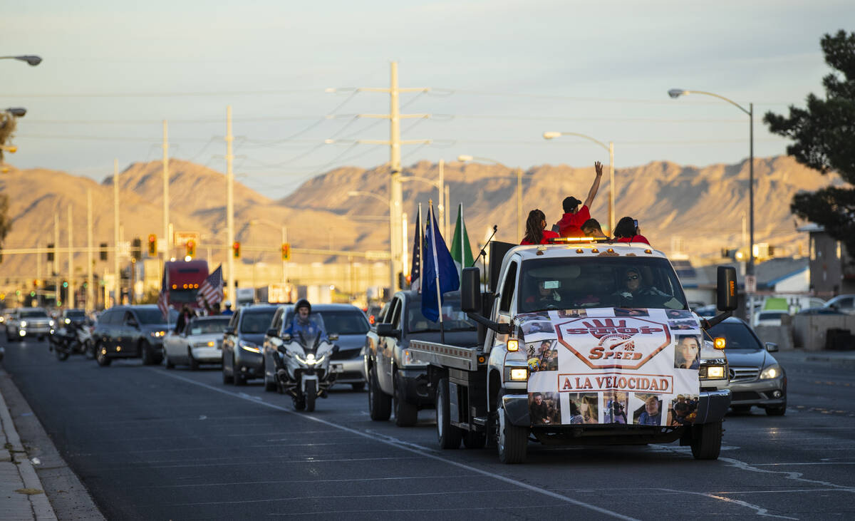 North Las Vegas police escort a vehicle caravan in memory of the seven Zacarias family members ...