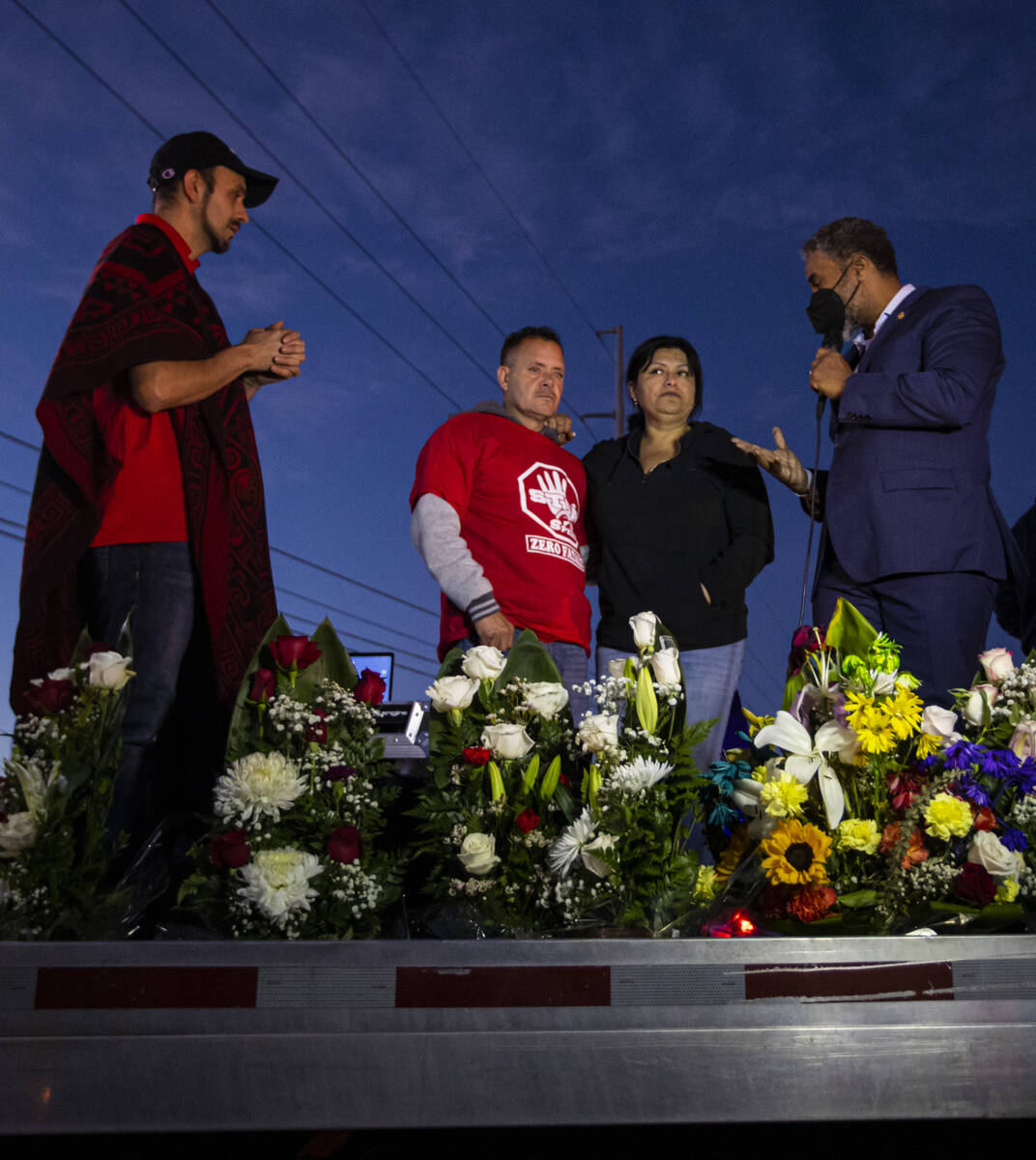 U.S. Rep. Steven Horsford, D-Nev., right, offers condolences to Jesus Mejia-Santana, second fro ...