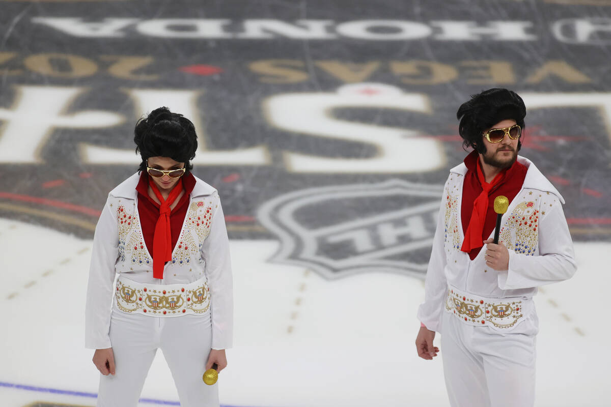 Elvis impersonators wait to perform before the NHL All-Star Game at T-Mobile Arena in Las Vegas ...