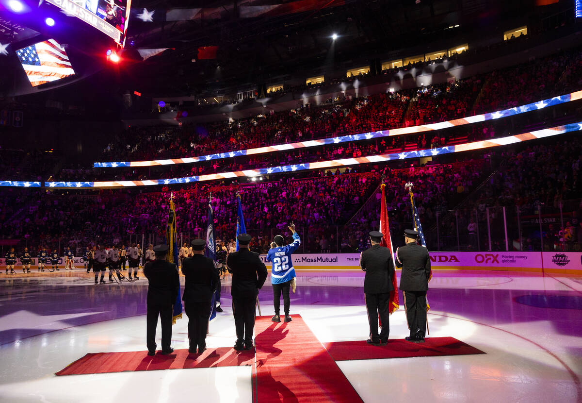 Blanco Brown sings the national anthem before the start of the NHL All-Star Game on Saturday, F ...