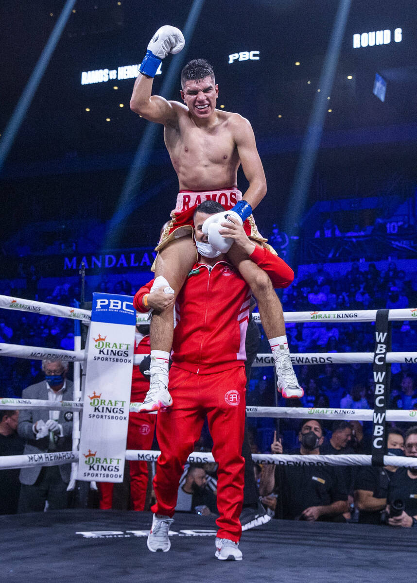 Jesús Ramos celebrates a TKO to Vladimir Hernandez during the sixth round of their super w ...
