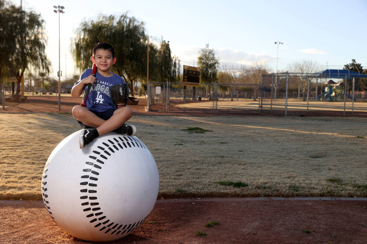 Evann Villanueva, 8, Las Vegas, outside the baseball fields at Kianga Isoke Palacio Park at Doo ...