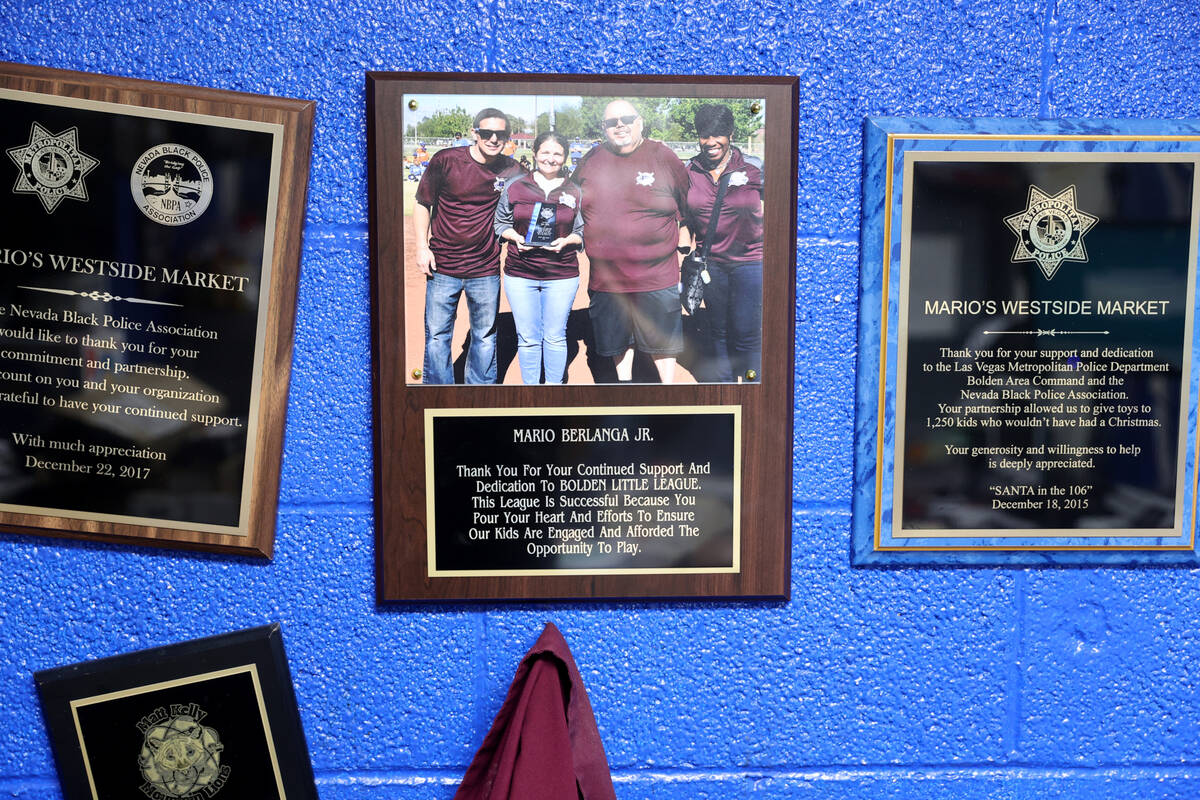 Youth baseball plaques in the office of Mario Berlanga, Jr., president of Mario's Westside Mark ...