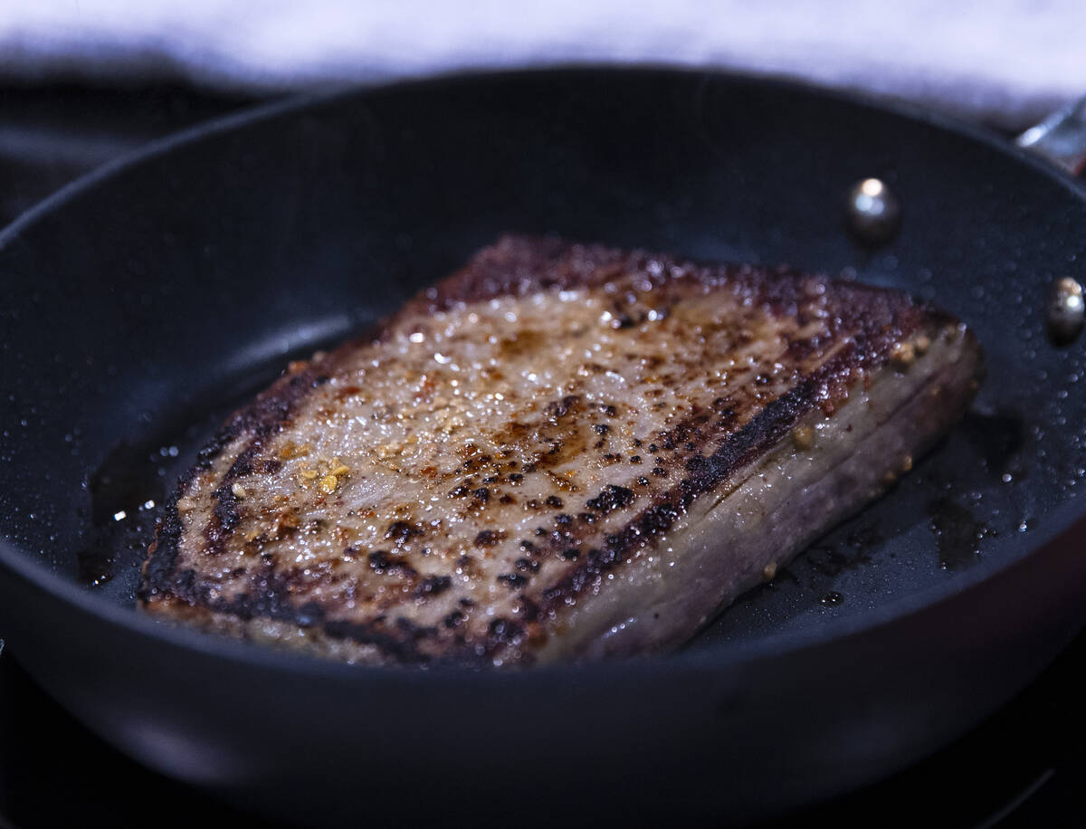 Seasoned steak is displayed at On the Rocks booth during the Fancy Food Show at the Las Vegas C ...