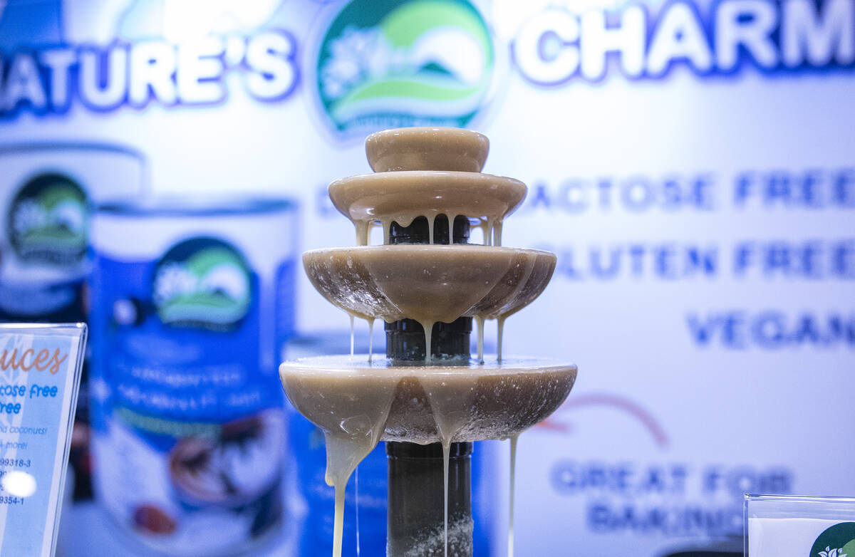 Sweetened condensed oat milk by Nature's Charm is displayed during the Fancy Food Show at the L ...