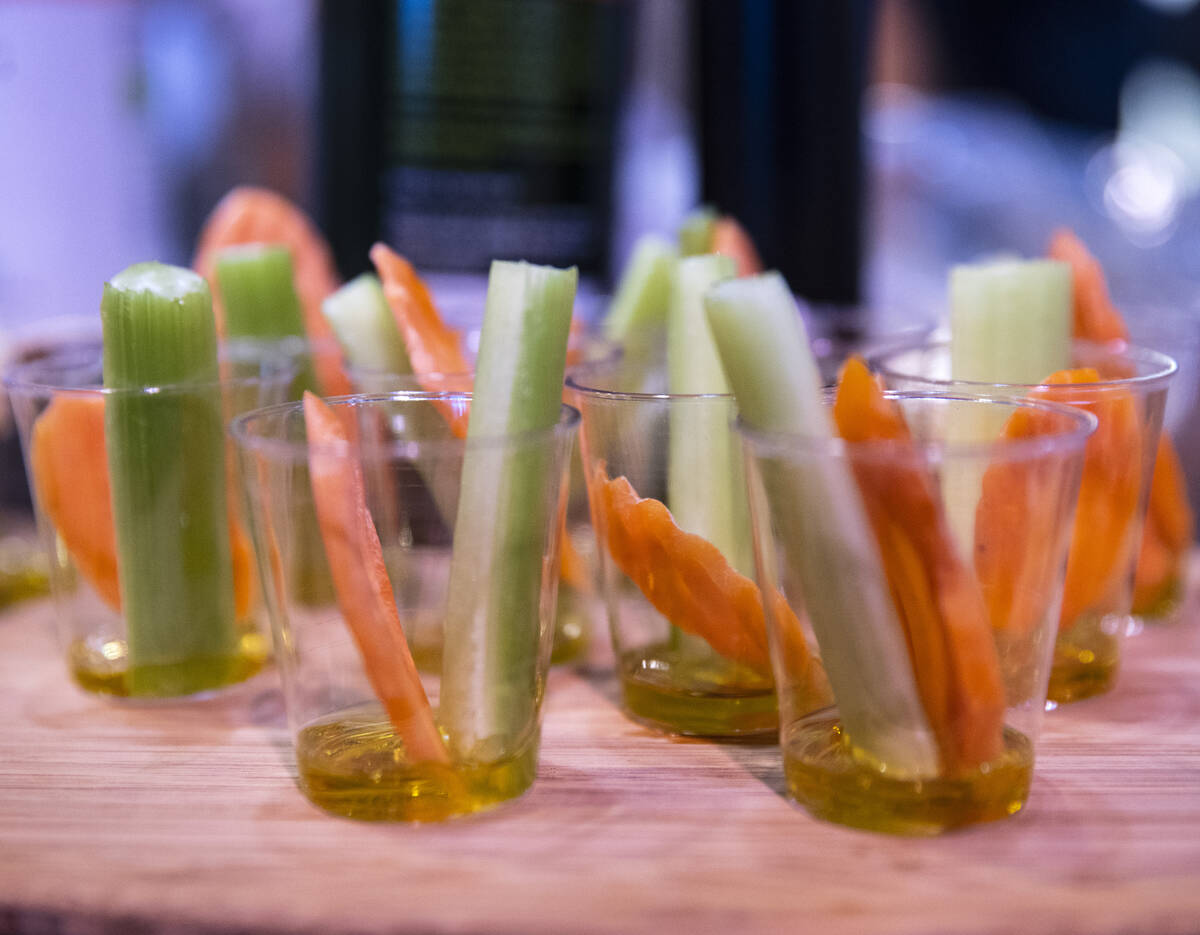 Samples of carrots and celery with virgin olive oil from Italy are displayed at at Mazzetti L&# ...
