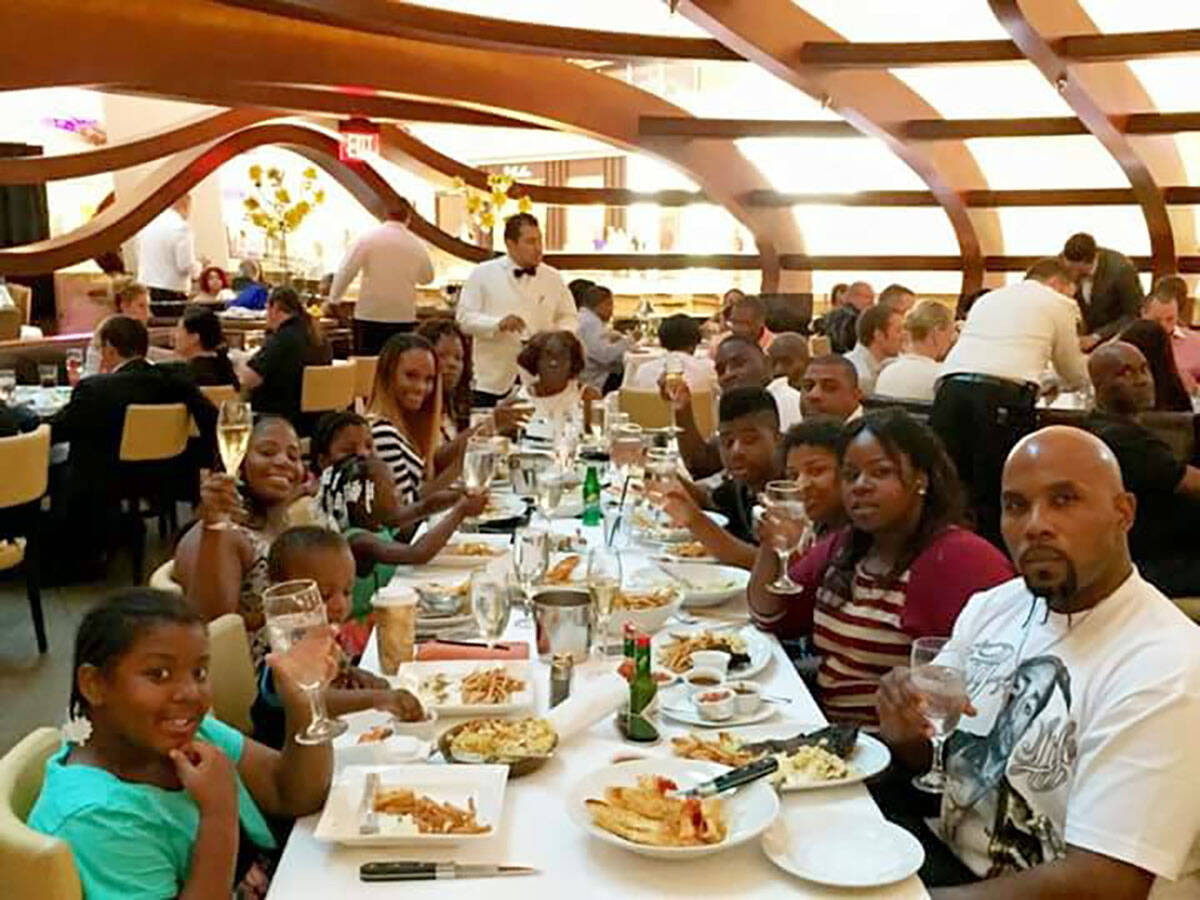 Tanaga Miller, 46, poses for a photo with his family on Mother's Day 2021. Miller died Jan. 29 ...