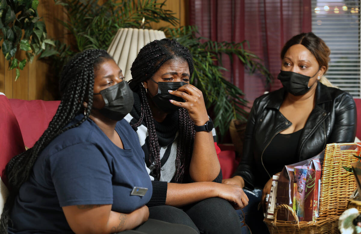 Jessica Stingley, from left, LaShonda Warfield and LaTory Houston react as they talk about Tana ...