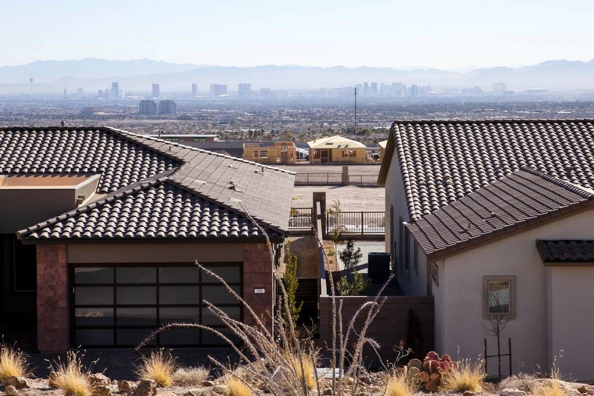 A new housing development, left, existing houses and the Strip as seen from Far Hills Avenue on ...