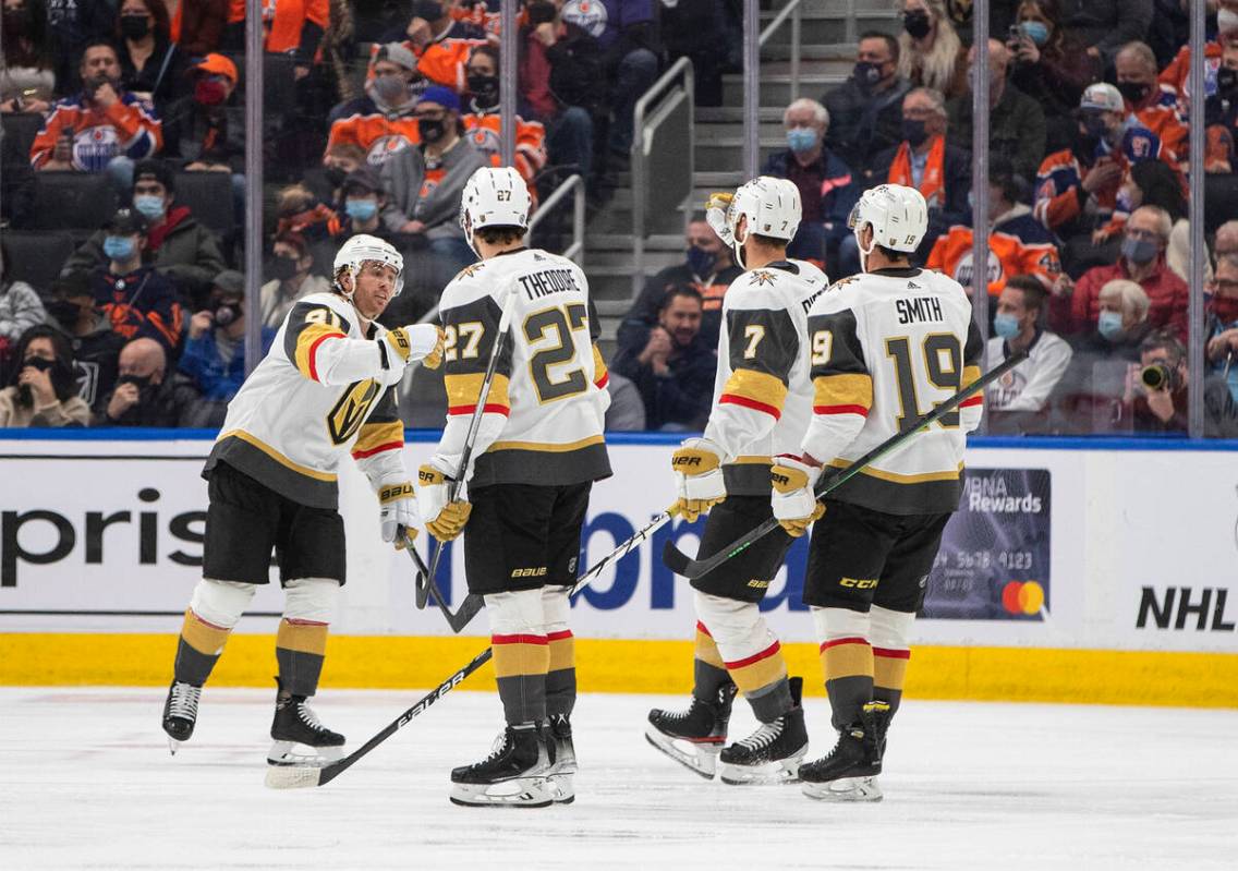 Vegas Golden Knights players celebrate a goal against the Edmonton Oilers during the second per ...