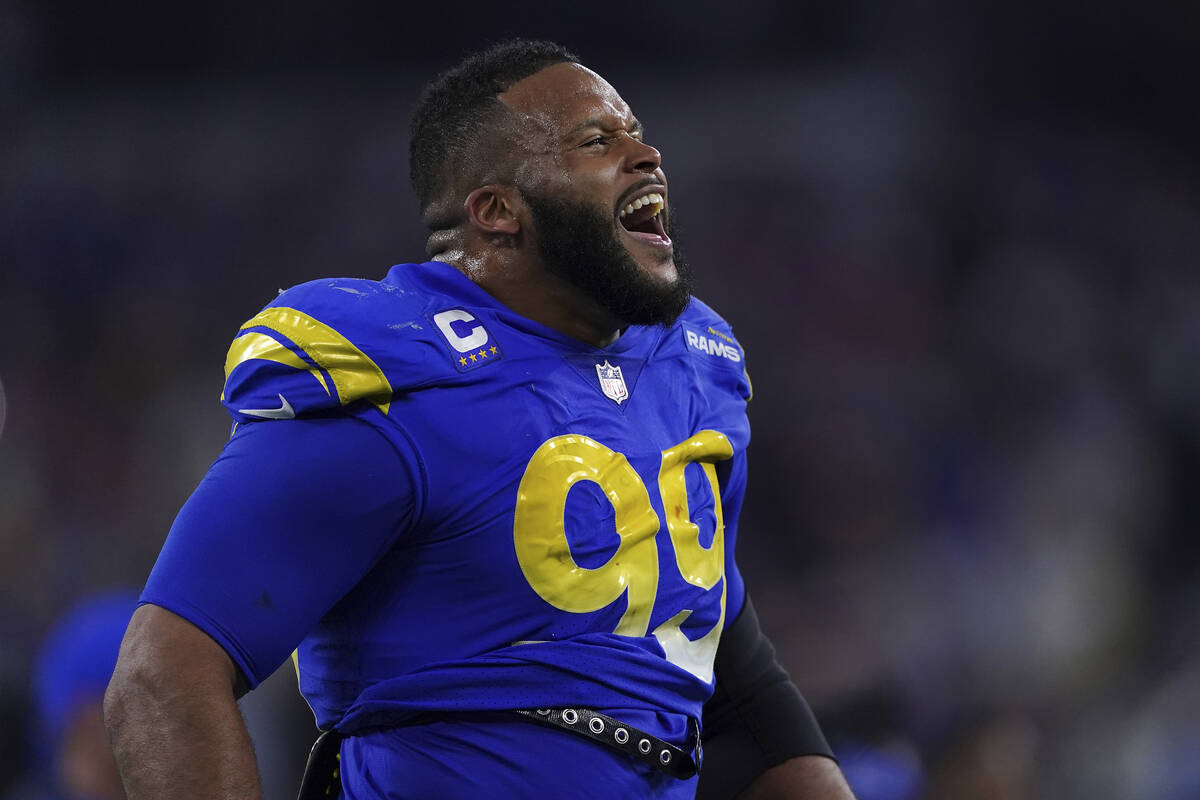 Los Angeles Rams defensive lineman Aaron Donald (99) celebrates his team's  victory over the San …
