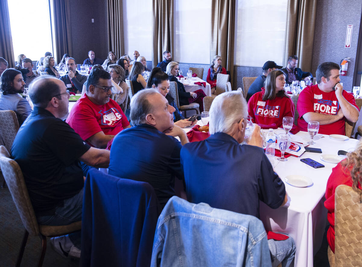 Supporters of Republican governor candidates watch the Republican debate on Tuesday, Feb 8, 202 ...