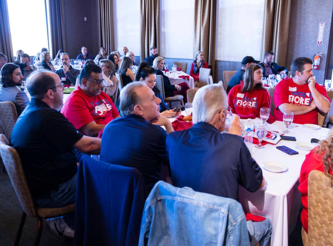 Supporters of Republican governor candidates watch the Republican debate on Tuesday, Feb 8, 202 ...