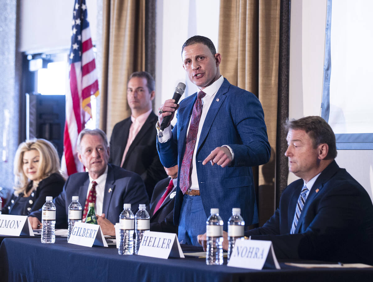 Nevada Republican governor candidates Michele Fiore, left, former North Las Vegas Mayor John Le ...