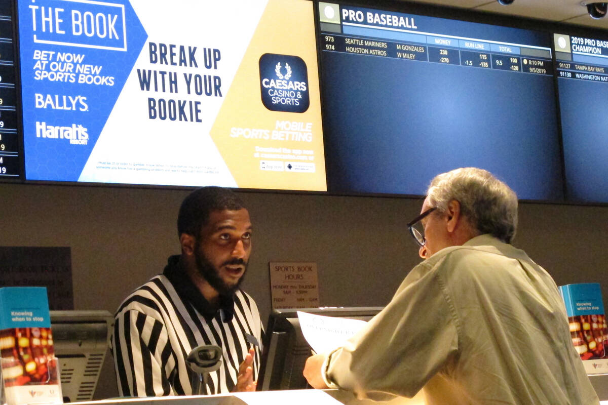 A gambler makes a sports bet at Bally's casino in Atlantic City N.J., Sept. 5, 2019. A record 3 ...